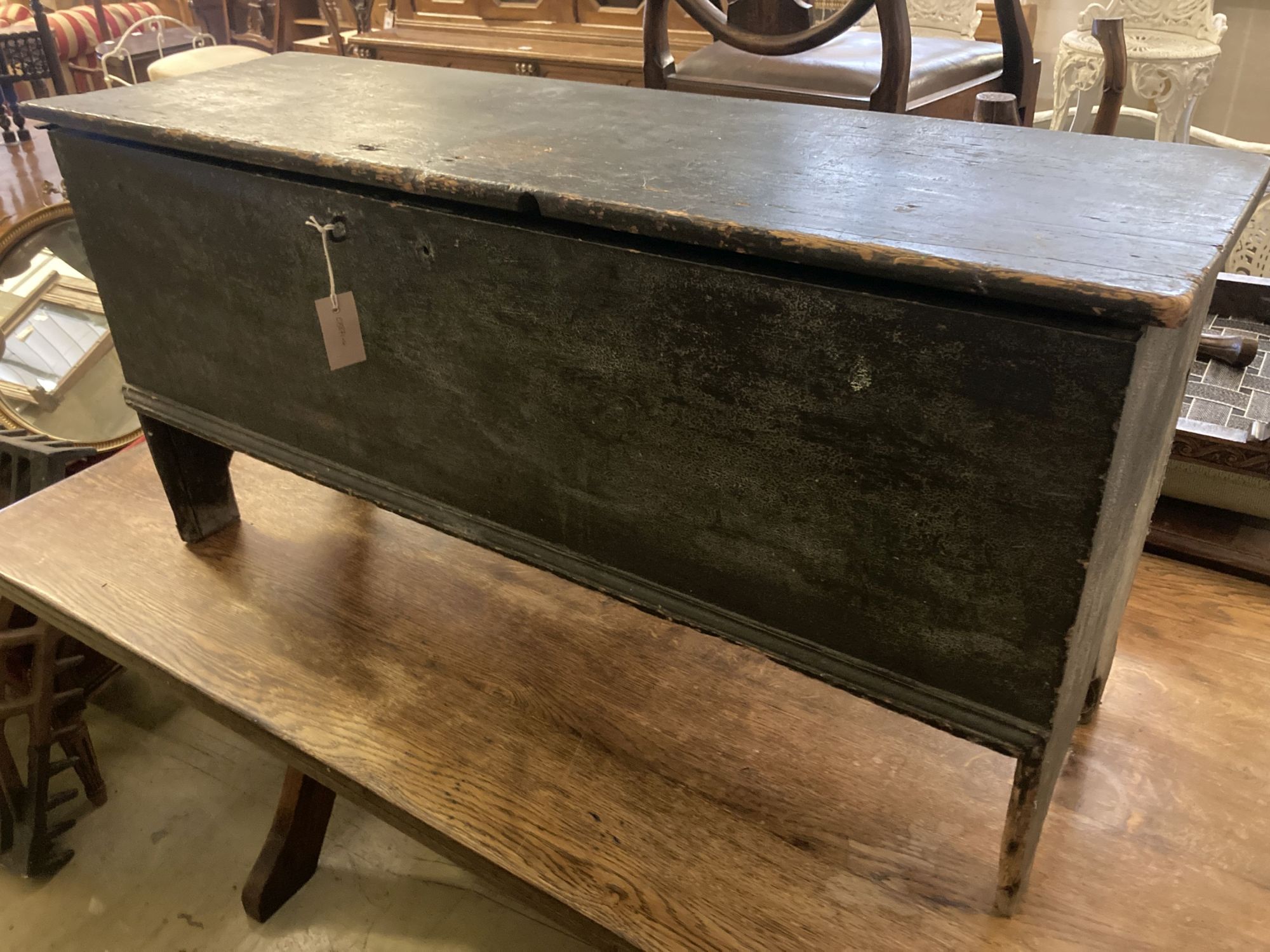 An 18th century stained pine six plank coffer, length 116cm, depth 38cm, height 58cm